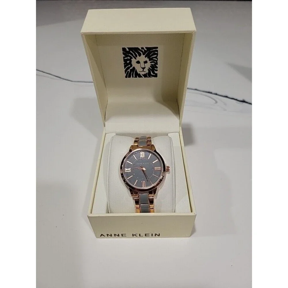 Anne Klein Women's Rose Gold-Tone and Light Pink Resin Bracelet Watch